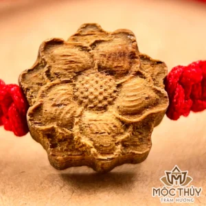 Vòng tay chỉ đỏ đan Mai Hoa